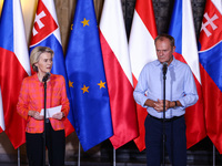 European Commission President Ursula von der Leyen and Polish Prime Minister Donald Tusk attend a press conference at the town hall in in Wr...