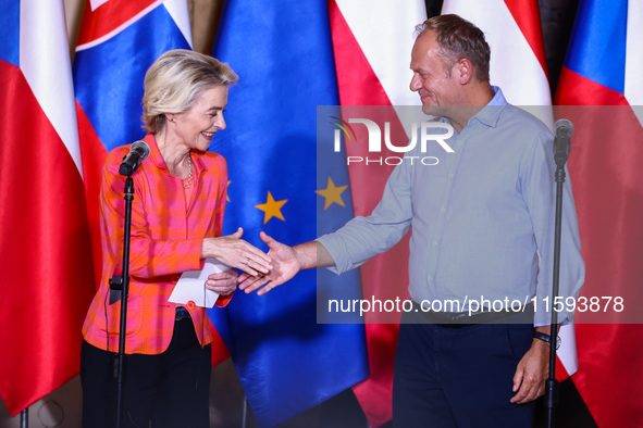 European Commission President Ursula von der Leyen and Polish Prime Minister Donald Tusk attend a press conference at the town hall in in Wr...