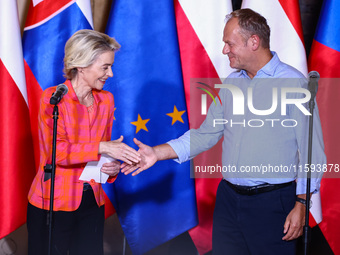 European Commission President Ursula von der Leyen and Polish Prime Minister Donald Tusk attend a press conference at the town hall in in Wr...