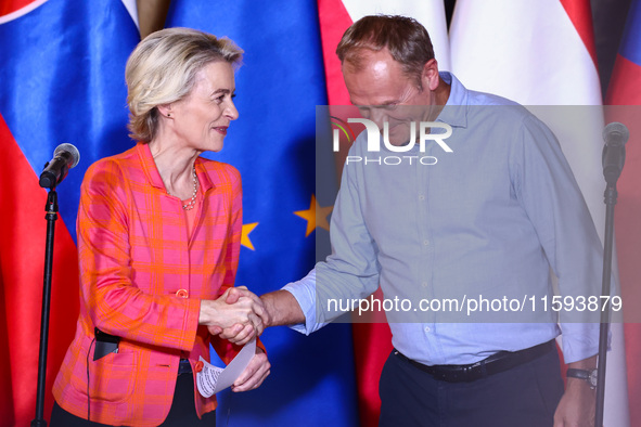 European Commission President Ursula von der Leyen and Polish Prime Minister Donald Tusk attend a press conference at the town hall in in Wr...