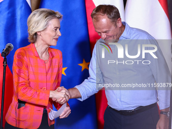 European Commission President Ursula von der Leyen and Polish Prime Minister Donald Tusk attend a press conference at the town hall in in Wr...