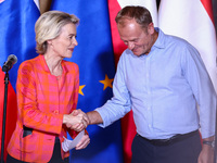 European Commission President Ursula von der Leyen and Polish Prime Minister Donald Tusk attend a press conference at the town hall in in Wr...