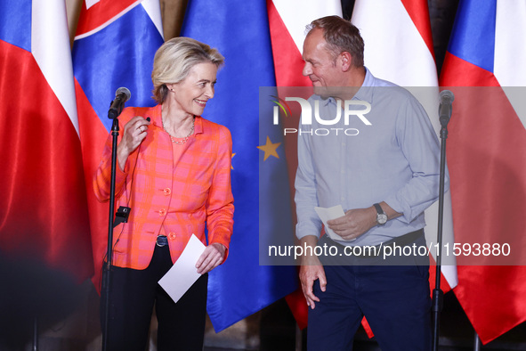 European Commission President Ursula von der Leyen and Polish Prime Minister Donald Tusk attend a press conference at the town hall in in Wr...