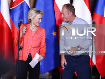 European Commission President Ursula von der Leyen and Polish Prime Minister Donald Tusk attend a press conference at the town hall in in Wr...