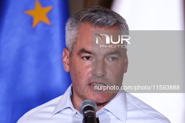 Austrian Chacellor Karl Nehammer attends a press conference at the town hall in in Wroclaw, Poland on September 19, 2024. The European Commi...