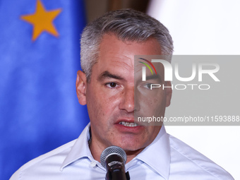 Austrian Chacellor Karl Nehammer attends a press conference at the town hall in in Wroclaw, Poland on September 19, 2024. The European Commi...