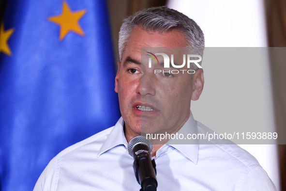 Austrian Chacellor Karl Nehammer attends a press conference at the town hall in in Wroclaw, Poland on September 19, 2024. The European Commi...