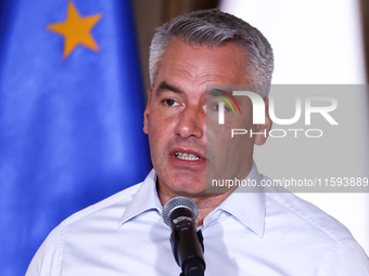 Austrian Chacellor Karl Nehammer attends a press conference at the town hall in in Wroclaw, Poland on September 19, 2024. The European Commi...