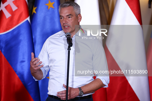 Austrian Chacellor Karl Nehammer attends a press conference at the town hall in in Wroclaw, Poland on September 19, 2024. The European Commi...