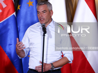 Austrian Chacellor Karl Nehammer attends a press conference at the town hall in in Wroclaw, Poland on September 19, 2024. The European Commi...