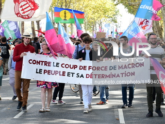 Protesters against the government of Michel Barnier and French President Emmanuel Macron in Lyon, France, on September 21, 2024. (