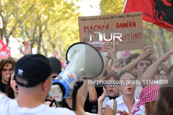 Protesters against the government of Michel Barnier and French President Emmanuel Macron in Lyon, France, on September 21, 2024. 