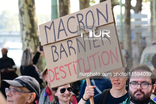 Protesters against the government of Michel Barnier and French President Emmanuel Macron in Lyon, France, on September 21, 2024. 