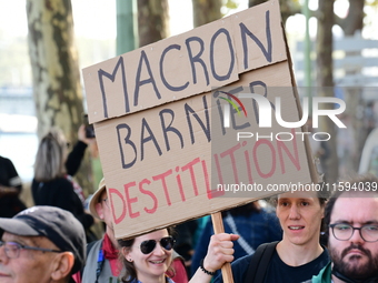 Protesters against the government of Michel Barnier and French President Emmanuel Macron in Lyon, France, on September 21, 2024. (