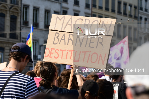 Protesters against the government of Michel Barnier and French President Emmanuel Macron in Lyon, France, on September 21, 2024. 