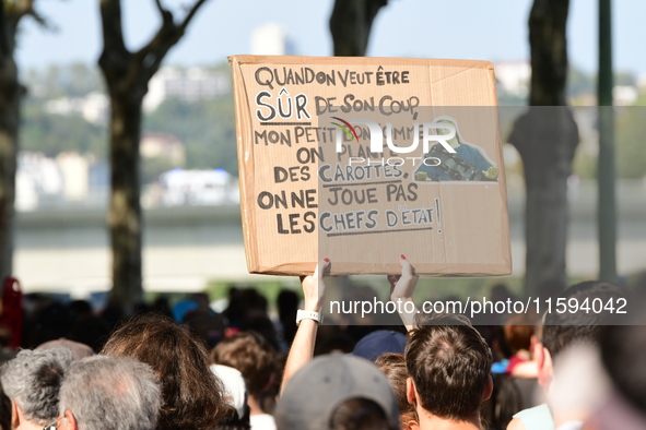 Protesters against the government of Michel Barnier and French President Emmanuel Macron in Lyon, France, on September 21, 2024. 