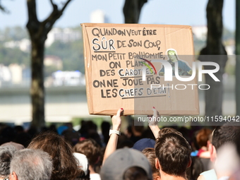 Protesters against the government of Michel Barnier and French President Emmanuel Macron in Lyon, France, on September 21, 2024. (