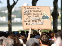 Protesters against the government of Michel Barnier and French President Emmanuel Macron in Lyon, France, on September 21, 2024. (