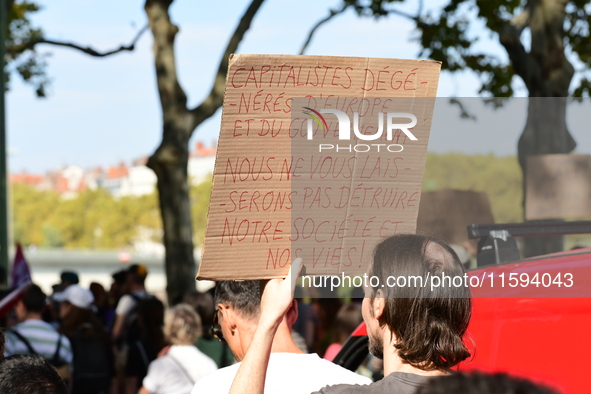 Protesters against the government of Michel Barnier and French President Emmanuel Macron in Lyon, France, on September 21, 2024. 