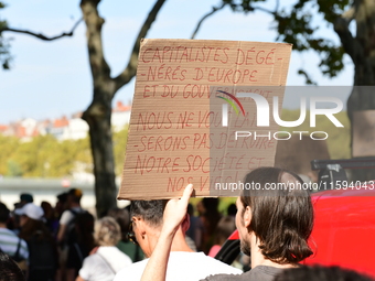 Protesters against the government of Michel Barnier and French President Emmanuel Macron in Lyon, France, on September 21, 2024. (