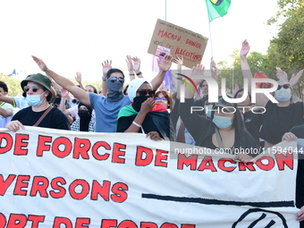 Protesters against the government of Michel Barnier and French President Emmanuel Macron in Lyon, France, on September 21, 2024. (