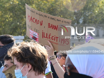 Protesters against the government of Michel Barnier and French President Emmanuel Macron in Lyon, France, on September 21, 2024. (