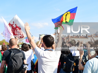 Protesters against the government of Michel Barnier and French President Emmanuel Macron in Lyon, France, on September 21, 2024. (