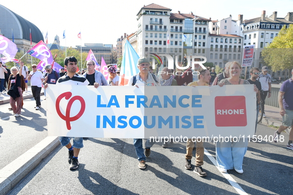 Protesters against the government of Michel Barnier and French President Emmanuel Macron in Lyon, France, on September 21, 2024. 