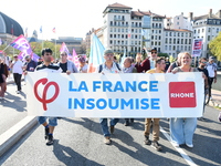 Protesters against the government of Michel Barnier and French President Emmanuel Macron in Lyon, France, on September 21, 2024. (