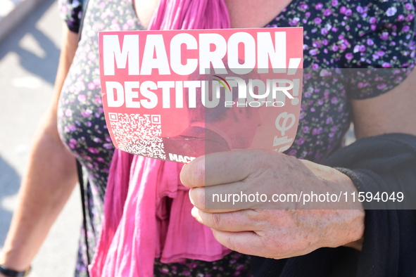 Protesters against the government of Michel Barnier and French President Emmanuel Macron in Lyon, France, on September 21, 2024. 