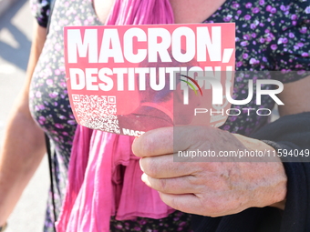 Protesters against the government of Michel Barnier and French President Emmanuel Macron in Lyon, France, on September 21, 2024. (