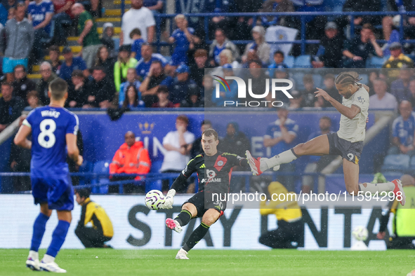 #30, Mads Hermansen of Leicester City clears the ball under pressure from #9, Dominic Calvert-Lewin of Everton during the Premier League mat...