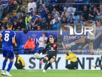 #30, Mads Hermansen of Leicester City clears the ball under pressure from #9, Dominic Calvert-Lewin of Everton during the Premier League mat...