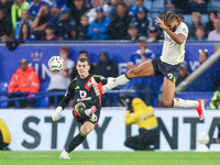 #30, Mads Hermansen of Leicester City clears the ball under pressure from #9, Dominic Calvert-Lewin of Everton during the Premier League mat...