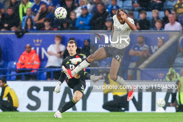 #30, Mads Hermansen of Leicester City clears the ball under pressure from #9, Dominic Calvert-Lewin of Everton during the Premier League mat...