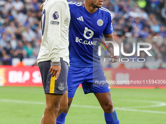 Ilman Ndiaye of Everton jostles for position with James Justin of Leicester City during the Premier League match between Leicester City and...