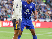 Ilman Ndiaye of Everton jostles for position with James Justin of Leicester City during the Premier League match between Leicester City and...