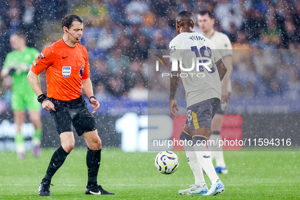 Referee Darren England restarts the game with a drop ball to #18, Ashley Young of Everton during the Premier League match between Leicester...