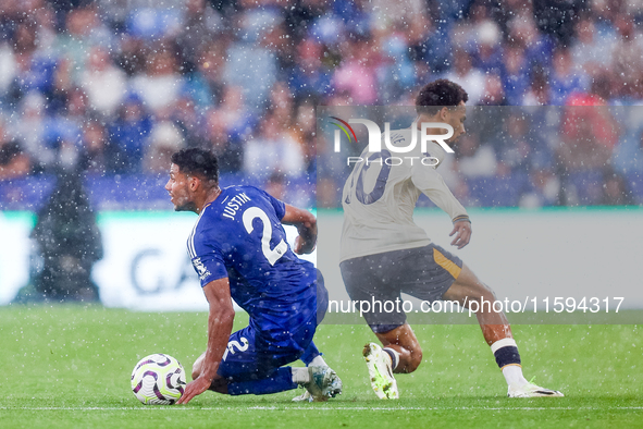 James Justin of Leicester City goes to the ground as he turns Ilman Ndiaye of Everton during the Premier League match between Leicester City...