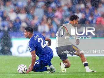 James Justin of Leicester City goes to the ground as he turns Ilman Ndiaye of Everton during the Premier League match between Leicester City...