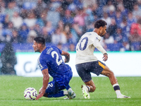 James Justin of Leicester City goes to the ground as he turns Ilman Ndiaye of Everton during the Premier League match between Leicester City...