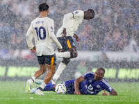 #18, Jordan Ayew of Leicester City fights for possession at the feet of #10, Ilman Ndiaye of Everton during the Premier League match between...