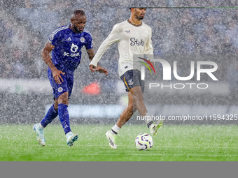 Ilman Ndiaye of Everton is chased by Jordan Ayew of Leicester City during the Premier League match between Leicester City and Everton at the...