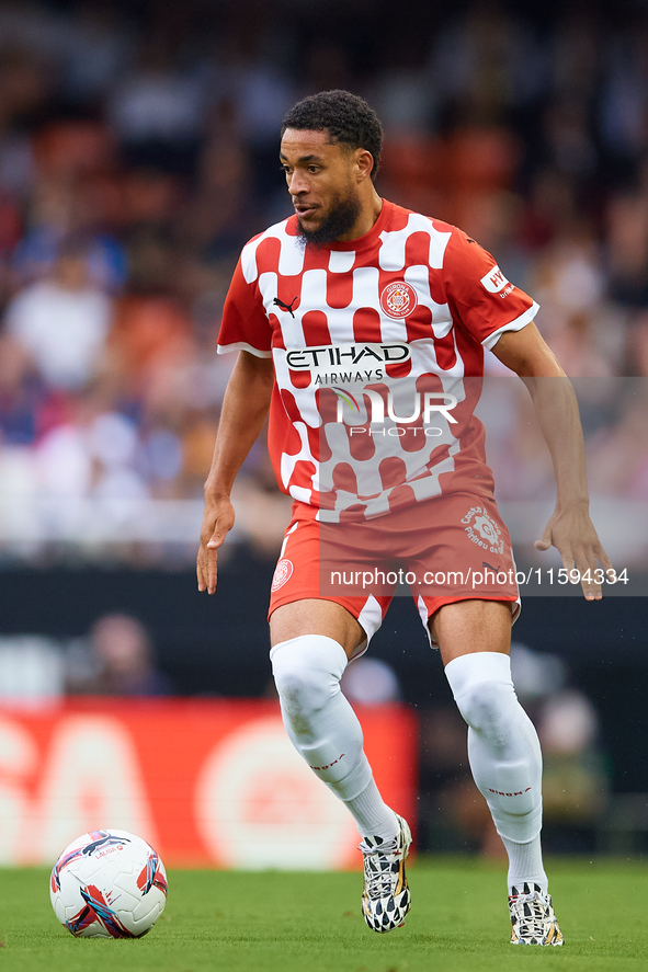 Arnaut Danjuma of Girona FC is in action during the LaLiga EA Sports match between Valencia CF and Girona FC at Mestalla stadium in Valencia...