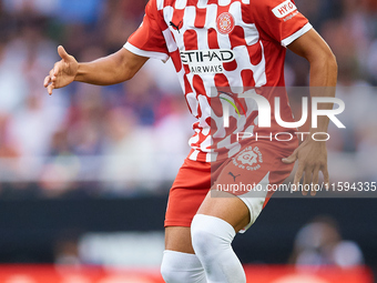 Arnaut Danjuma of Girona FC is in action during the LaLiga EA Sports match between Valencia CF and Girona FC at Mestalla stadium in Valencia...