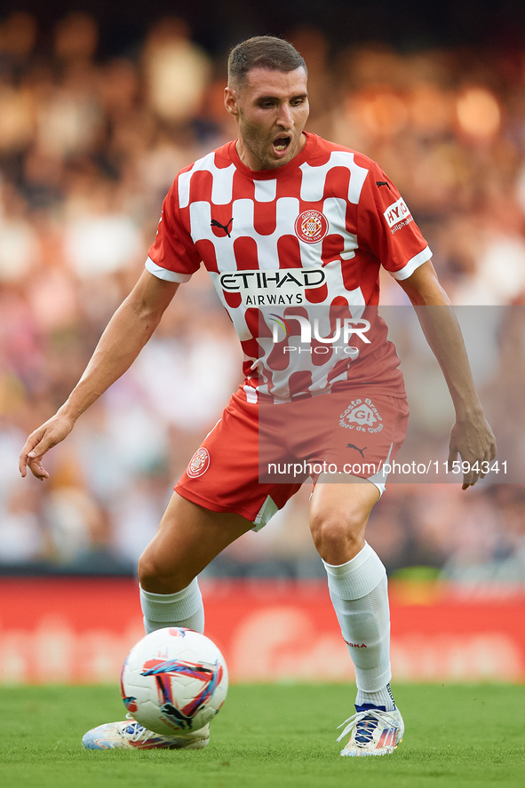 Abel Ruiz of Girona FC is in action during the LaLiga EA Sports match between Valencia CF and Girona FC at Mestalla stadium in Valencia, Spa...