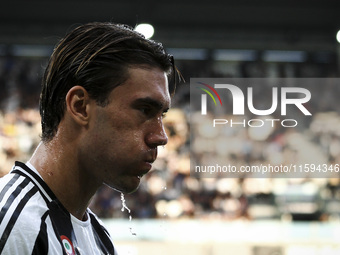 Juventus forward Dusan Vlahovic (9) refreshes himself during the Serie A football match number 5 between Juventus and Napoli in Turin, Italy...