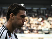 Juventus forward Dusan Vlahovic (9) refreshes himself during the Serie A football match number 5 between Juventus and Napoli in Turin, Italy...