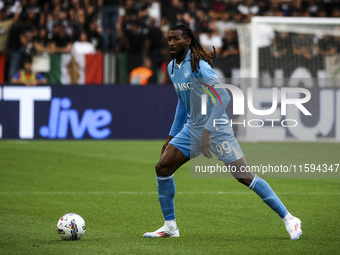 Napoli midfielder Andre-Frank Anguissa (99) is in action during the Serie A football match number 5 between Juventus and Napoli at the Allia...