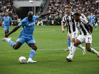 Napoli forward Romelu Lukaku (11) shoots the ball during the Serie A football match number 5 between Juventus and Napoli in Turin, Piedmont,...